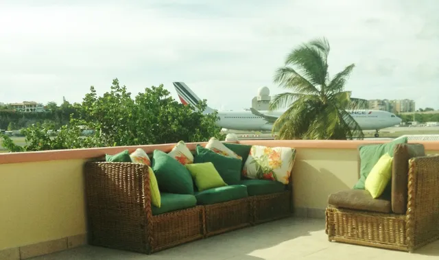 Communal roof terrace of the White Sands complex with lounge seating